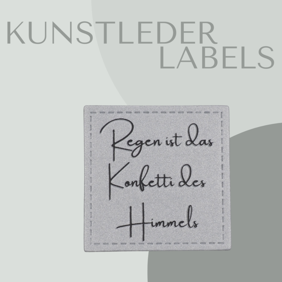 reflektierendes Kunstleder Label eckig mit der Aufschrift "regen ist das konfetti des himmels" in silber