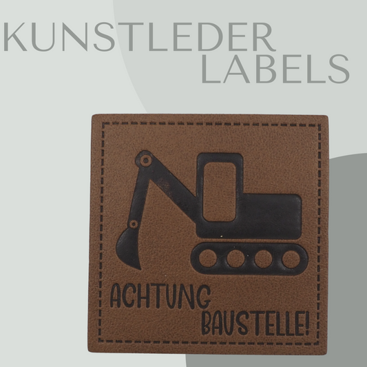 Kunstleder Label eckig in braun mit der Aufschrift "Achtung Baustelle"