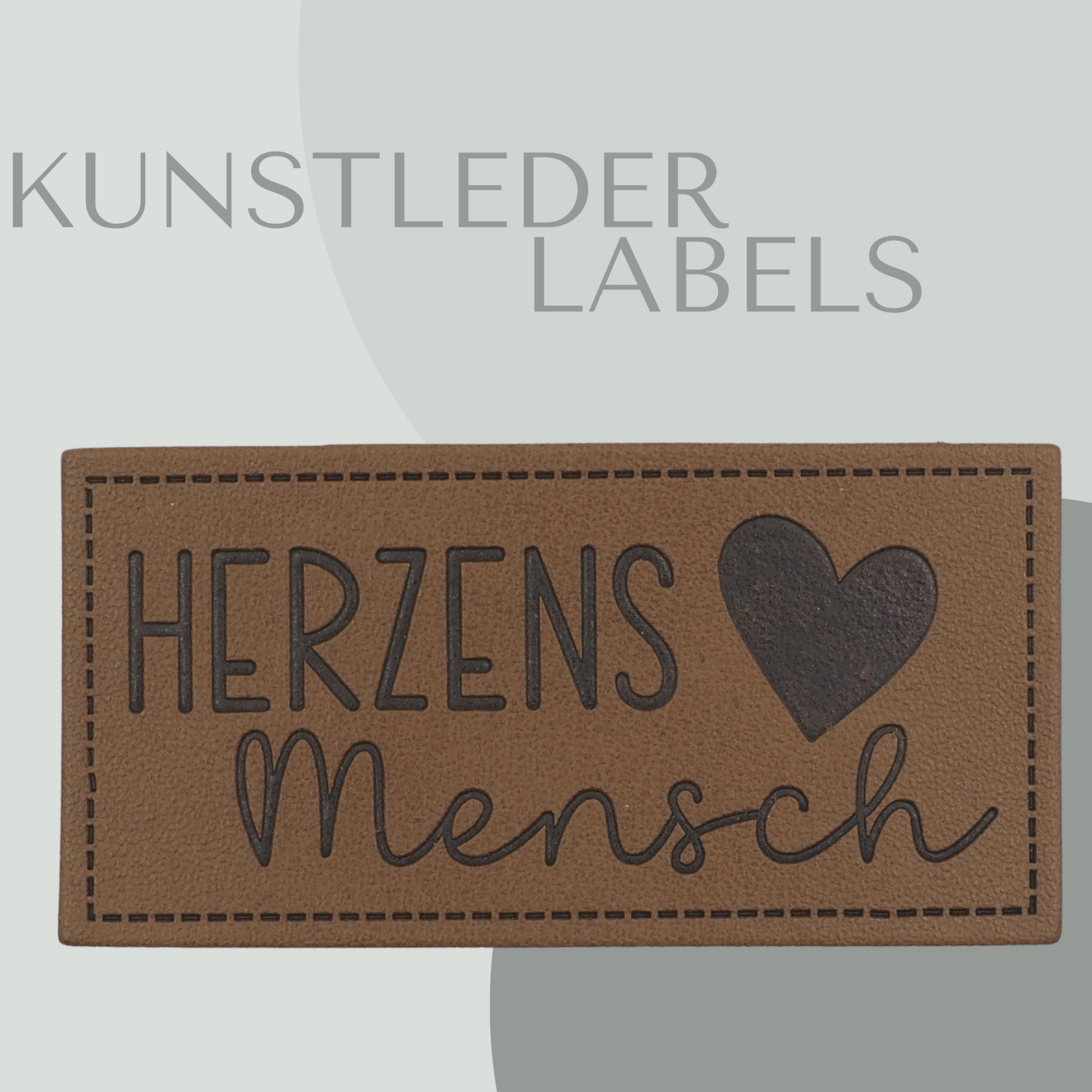 Kunstleder Label eckig in braun mit der Aufschrift "Herzens Mensch"