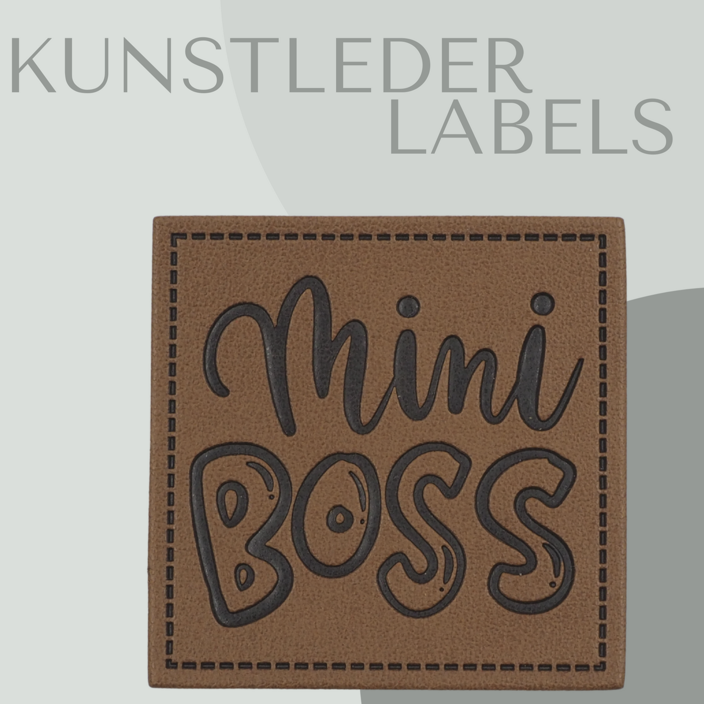 Kunstleder Label eckig in braun mit der Aufschrift "mini boss"