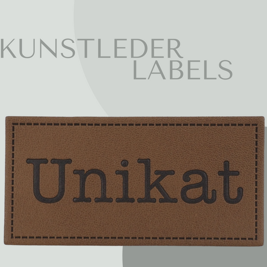 Kunstleder Label eckig in braun mit der Aufschrift "Unikat"