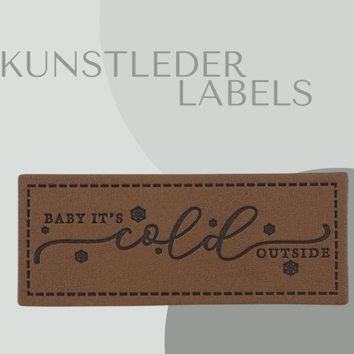 Kunstleder Label eckig in braun mit der Aufschrift "baby it's cold outside"