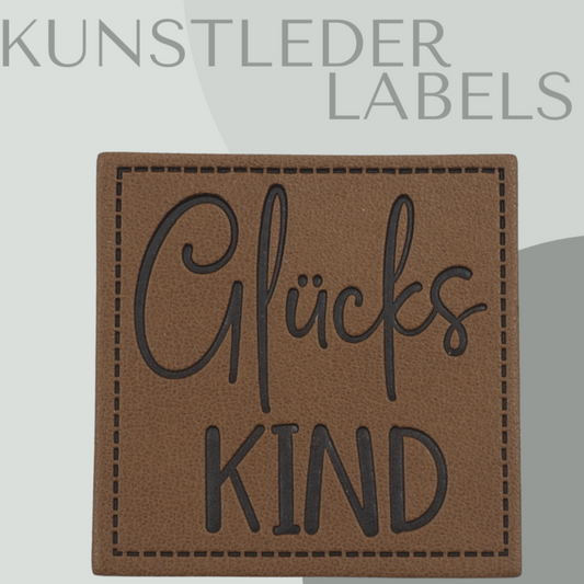 Kunstleder Label eckig in braun mit der Aufschrift "Glücks Kind"