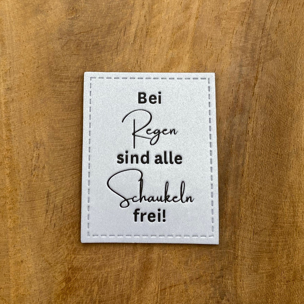 Bei Regen sind alle Schaukeln frei Reflektierendes Label