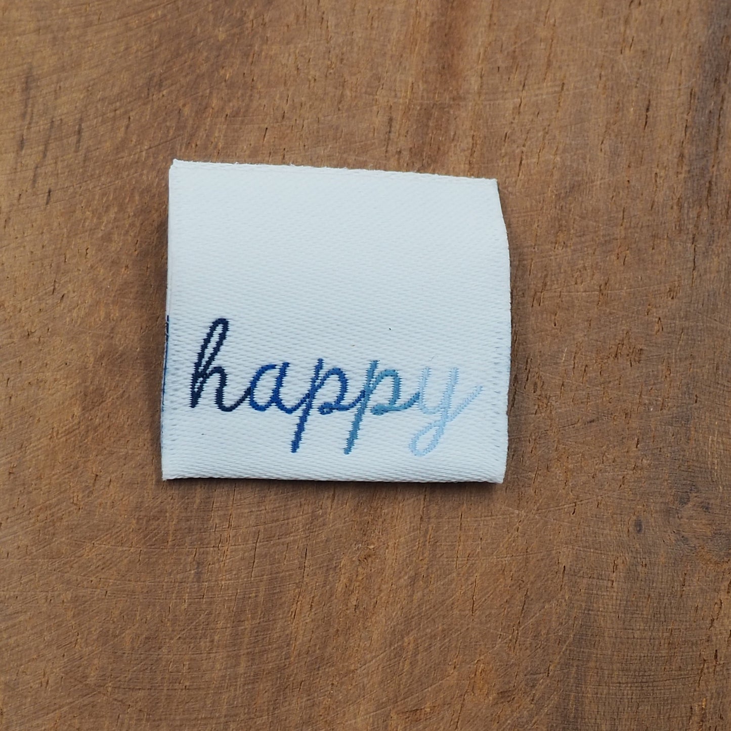 happy Web Label gewebt Eigenproduktion