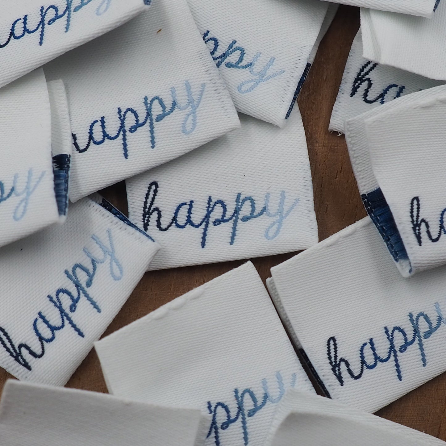 happy Web Label gewebt Eigenproduktion
