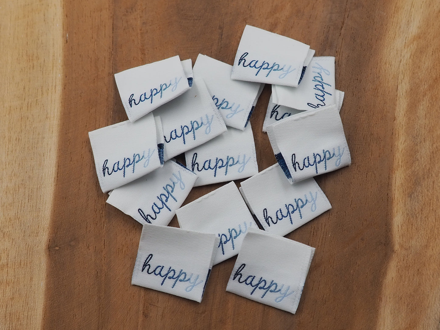 happy Web Label gewebt Eigenproduktion