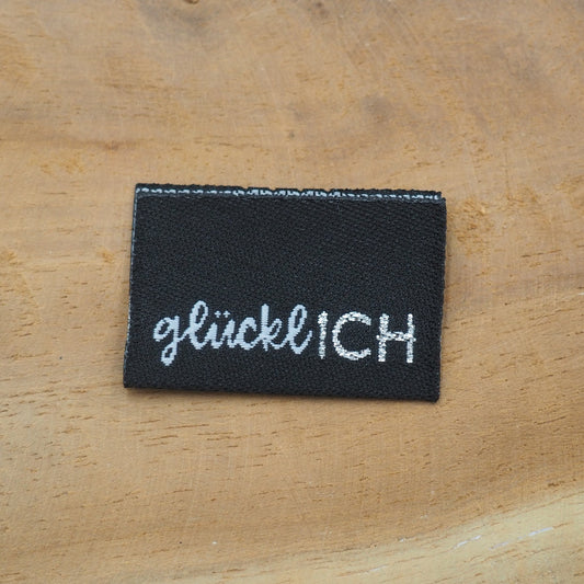 glücklICH in Schwarz Web Label gewebt Eigenproduktion