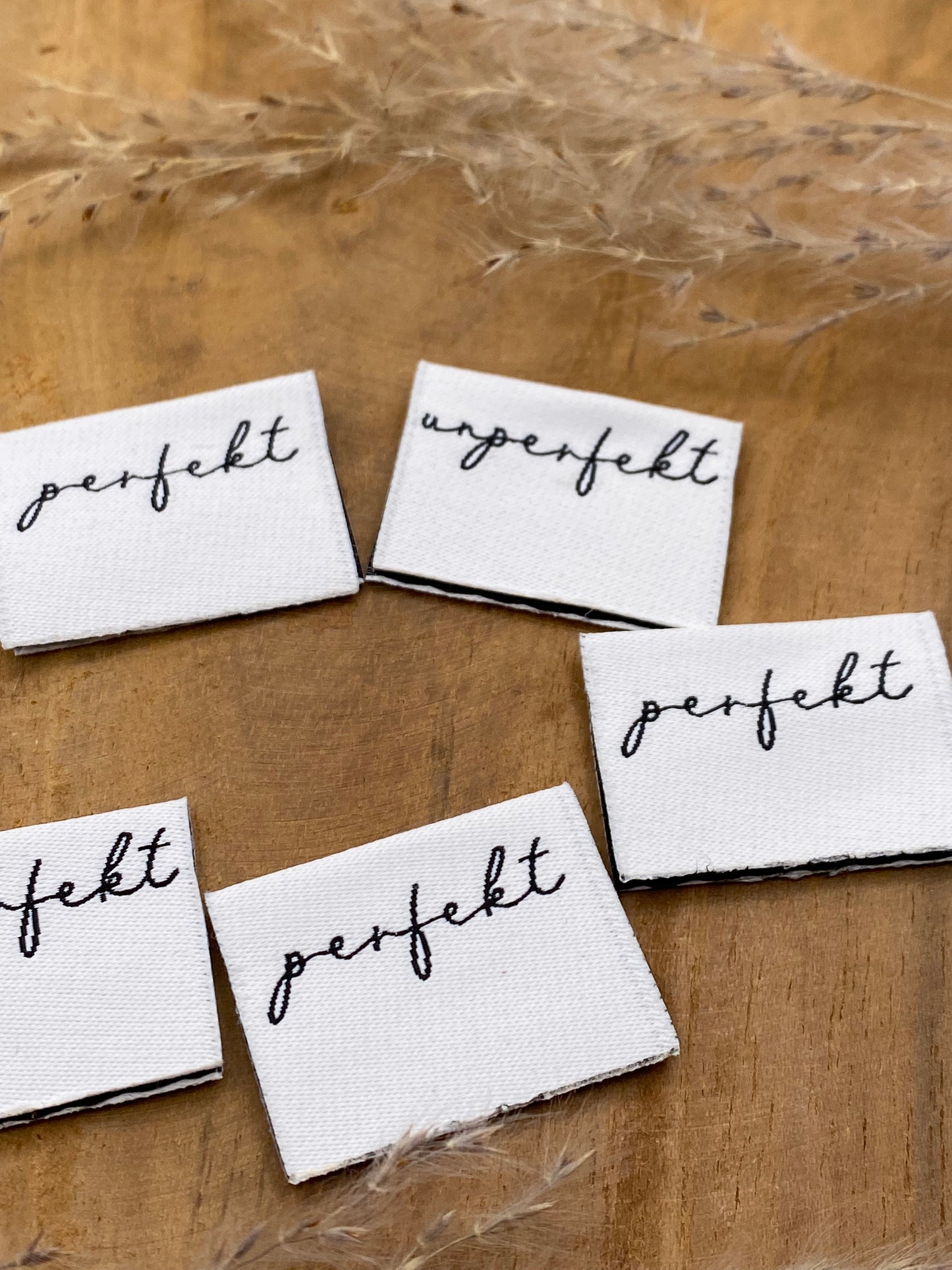 perfekt / unperfekt Web Label gewebt Eigenproduktion